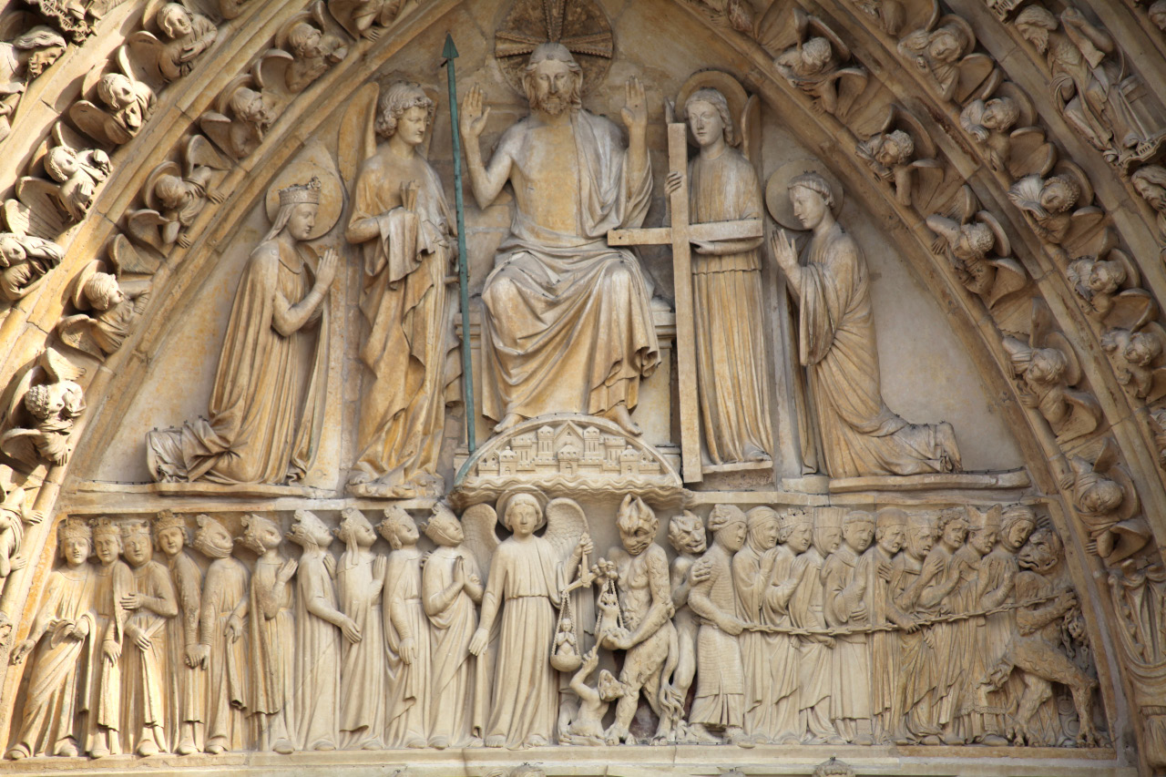 The Last Judgement by Christ depicted on facade of Notre Dame in Paris