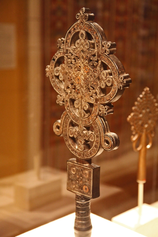 Processional Cross c. 1500 of wood with metal inlay attributed to Ezra c 1460 - 1522 of the Stephanite monastic order of Tigray region of Ethiopia in MMA in NYC